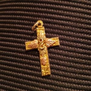 Golden cross pendant